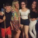 Marshall Metcalfe with his mum and sisters
