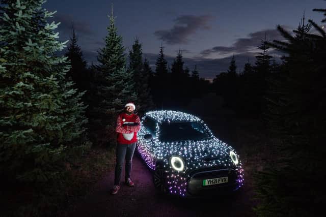 Mini are supporting Nico, providing him with a Mini Electric wrapped in thousands of lights ready for him to take out on the road (Picture: Jacob King/Press Association Images)