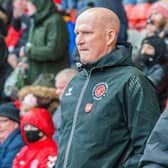 Simon Grayson feels as though the whole world is against his Fleetwood Town side