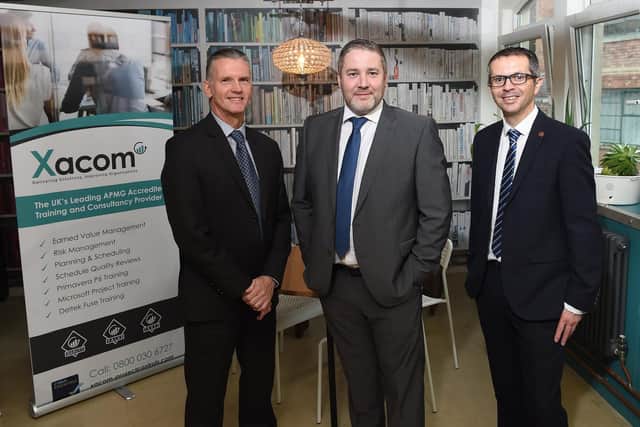 Xacom based in Cross Street Preston has plans to double its turnover every year thanks to help from Lancashire's Boost project.
Pictured are, Paul Bury (Boost Mentor) with Michael Higgins (from Xacom) and Councillor Aidy Riggott.
