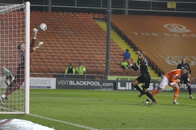 Gary Madine had Blackpool's clearest chance of the night - but was thwarted by England international Sam Johnstone