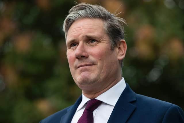 Labour Party leader Sir Keir Starmer has accused the government of breaking a promise that people would not have to sell their homes to cover care costs, but Boris Johnson says he is fixing a problem that the opposition failed to address when they were in power