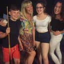 Marshall Metcalfe with mum Jane and his two sisters