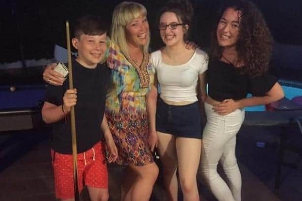 Marshall Metcalfe with mum Jane Ireland and sisters Macy and Holly