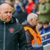 Stephen Crainey's first game as interim head coach ended with a point for Fleetwood at Wimbledon