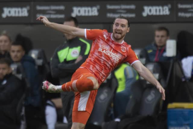 Left-back James Husband has also been dependable for Blackpool in the heart of defence