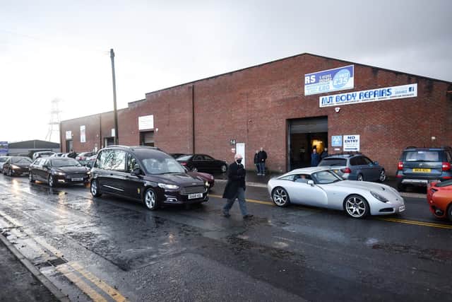 The funeral cortege of John Mlezcek sets off form outside the Bristol Avenue factory that once housed sports car maker TVR