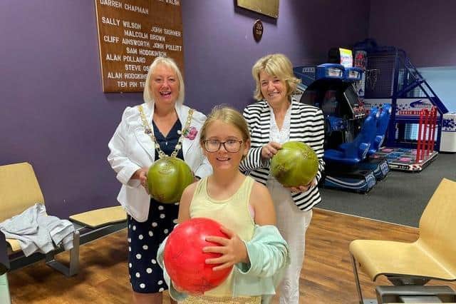 Coun Andrea Kay, Coun Lynne Bowen and Evie Abram play a game of bowling at one of Wyre Council's holiday clubs. Pic: Wyre Council