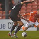 Owen Dale looks to get past his man during yesterday's defeat to Luton