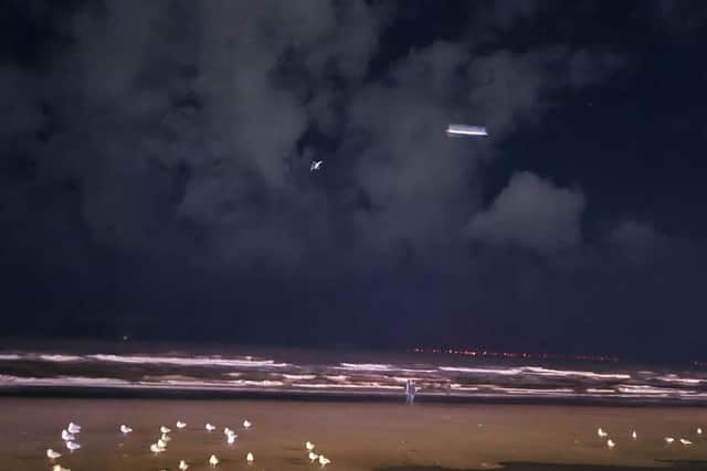 Zowie Sinclair says the saucer-shaped object was caught on camera as it appeared above the beach opposite Coral Island at 8.41pm on Saturday, October 30