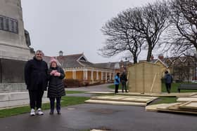 STEP chairman Veli Kirk and fellow organiser Dorothy Aitken watch the market cabins being set up.