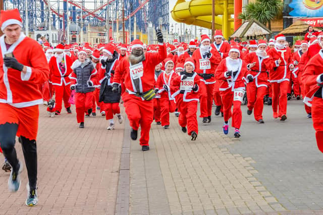 A total of 2,000 santas took part in this year's Santa Dash