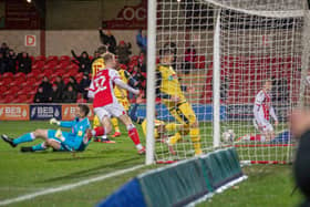 Ged Garner opens the scoring in Fleetwood's three-goal victory over Bolton