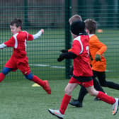 Action from Thornton Cleveleys Tigers v YMCA at the Blackpool and District Youth Football League's Under-7 festival