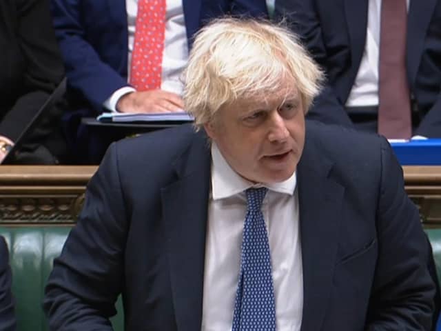 Prime Minister Boris Johnson speaks during Prime Minister's Questions in the House of Commons earlier today