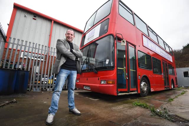Sean Ryan from Shop It Local, and the London bus which is to be turned into a mobile homeless shelter
