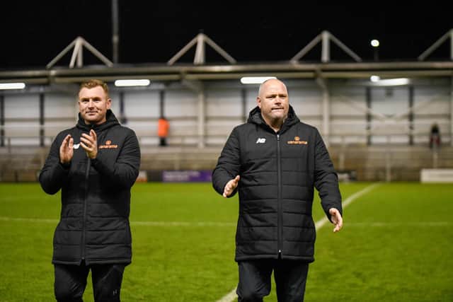 Fylde boss Jim Bentley (right) and assistant Nick Chadwick applaud the supporters after the 4-1 win over Blyth Spartans
Picture: STEVE MCLELLAN