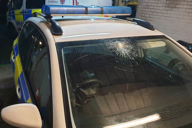An appeal for CCTV footage is under way after the patrol car window was smashed in Bold Street, near the police station, between 7pm and 7.20pm