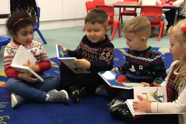 Pupils at St Kentigern’s Primary School, in Blackpool, with their free books courtesy of Get Blackpool Reading