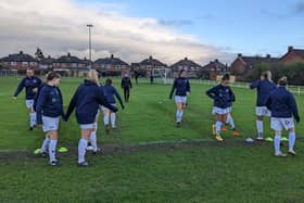 The teams warm up at Norton