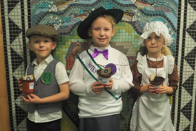 Thomas Armstrong, Edith Wilson and Sofia Liberati, Year 2 pupils at Stalmine Primary, celebrate the school's 150th anniversary in Victorian costume