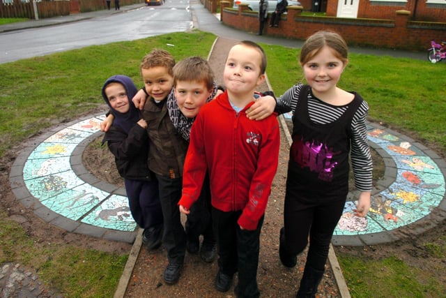 Some of the children from Moor Nook who helped to make a mosaic path on the estate in Preston