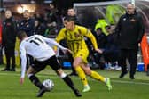 Fylde's defeat at Darlington was a difficult watch for boss Jim Bentley (right)
