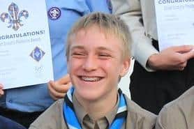 The  scouts were fundraising in memory of fellow scout Lucas Backhouse (pictured)