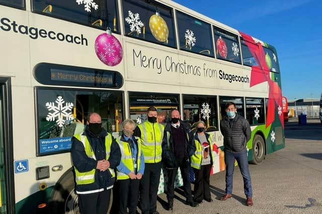 County Coun Charlie Edwards with Stagecoach staff in Morecambe