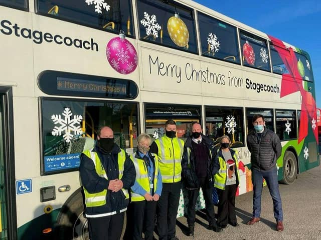 County Coun Charlie Edwards with Stagecoach staff in Morecambe