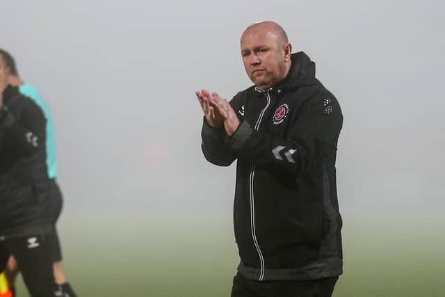 Stephen Crainey applauds the supporters after the draw at Morecambe