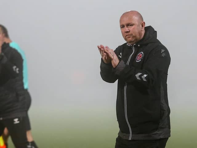 Stephen Crainey applauds the supporters after the draw at Morecambe