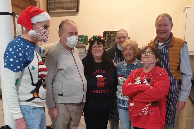 The Mustard Seed team prepare to serve Christmas dinner to 36 guests