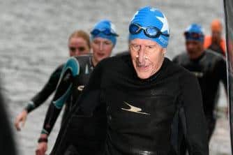 Ian pictured just days before his accident at the end of his Epic swim in Lake Windermere