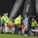Tom Lees was stretchered off with a head injury yesterday