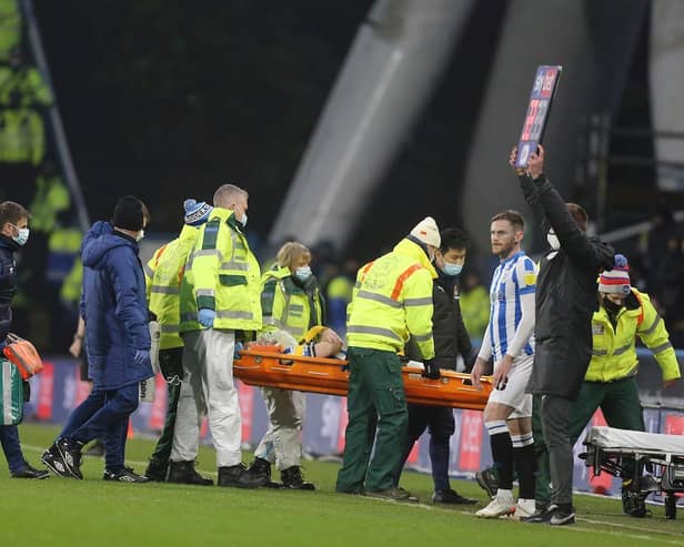 Tom Lees was stretchered off with a head injury yesterday