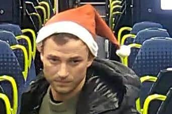Police are asking the public to help identify the man in the CCTV image after an officer was assaulted at Poulton train station on December 16