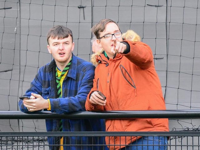 Fans watch on