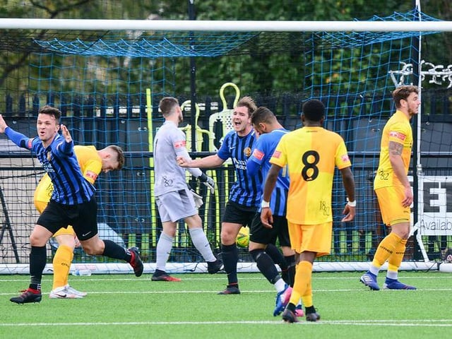 Dan Parkinson celebrates his winner for Sevenoaks Town