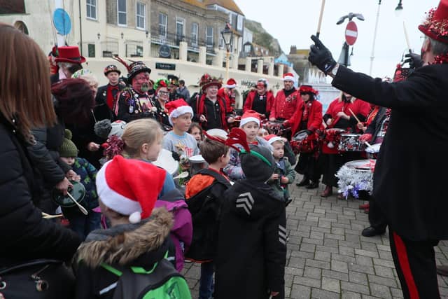 Winkle Club's Children's Christmas procession/party in Hastings Old Town. Photo by Roberts Photographic. SUS-211213-070258001