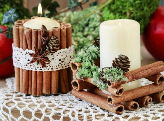 Nothing screams Christmas more than a cosy evening with candles lit. Bring the festive scent of cinnamon into the mix by making your own cinnamon stick candle holder.
Secure cinnamon sticks around a candle with a rubber band, then tie with festive themed ribbon or twine. The candles also make the sweetest-smelling, rustic centrepiece.