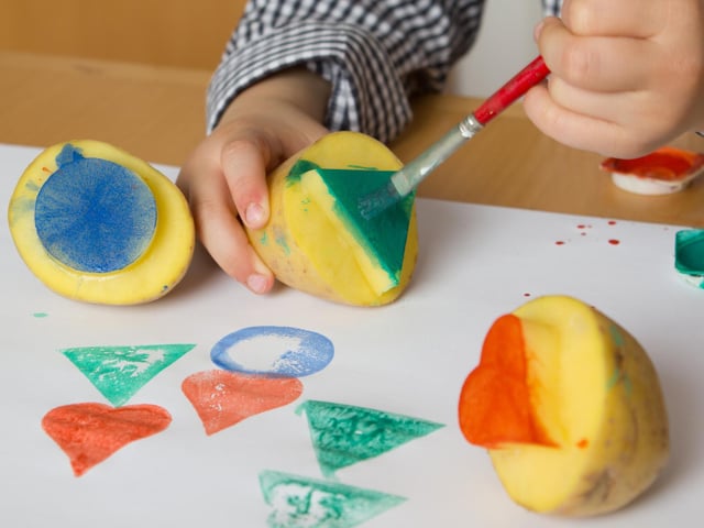 Potato stamps - making personal Christmas cards is a lovely touch and an old standing tradition to pass on Christmas well wishes.
Potatoes can be carved by an adult to create shapes like stars and trees.
These easy-to-use stamps work well with brightly-coloured poster paint, and they can also be used to decorate wrapping paper and gift bags.
