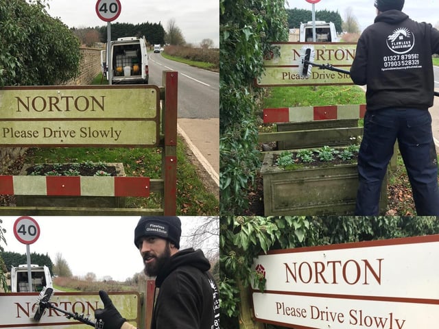 Ross gets to work on the sign in Norton.