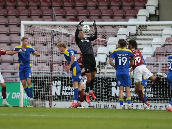 Cobblers could find no way past Wimbledon's defence. Pictures: Pete Norton.
