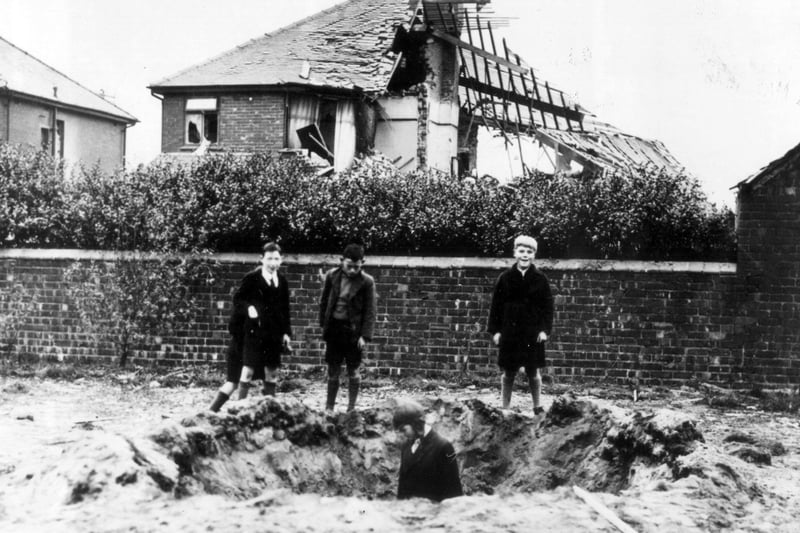 Youngsters make a game of war in Church Road, St Annes, 1940