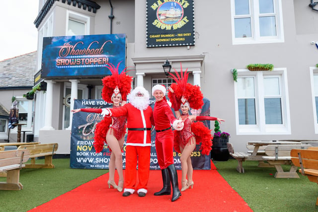 Reece Oliver and The Showboat Showgirls with Santa Claus at the Showboat venue on Queen's Promernade. Photo: Kelvin Stuttard