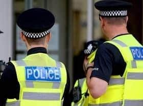 Police have warned of a conman calling at people's homes in the Blackpool area, after for help.