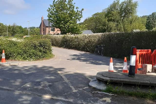 Concrete barriers between the junction of Division Lane and Midgeland Road have been removed