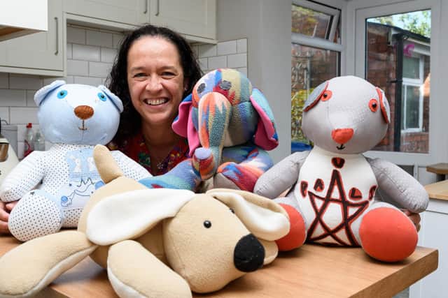 Sue Dupree makes memorial teddies out of old clothes - it started when her mum died of Parkinson's and she had an old coat so she made it into a teddy as a way of remembering her. Photo: Kelvin Stuttard