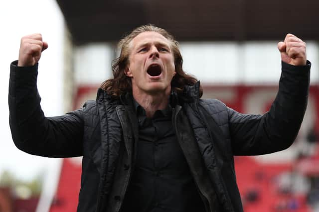 STOKE ON TRENT, ENGLAND - APRIL 29: Gareth Ainsworth manager of Queens Park Rangers celebrates following the Sky Bet Championship between Stoke City and Queens Park Rangers at Bet365 Stadium on April 29, 2023 in Stoke on Trent, England. (Photo by Nathan Stirk/Getty Images)